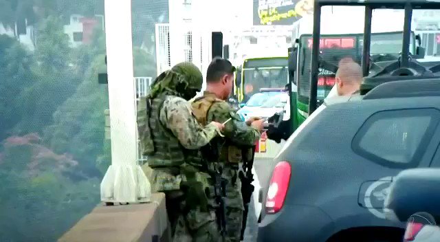 Video shows the moment a hostage-taker is shot by police in Rio de Janeiro, Brazil; the man held up to 37 people hostage at a bus according to AP